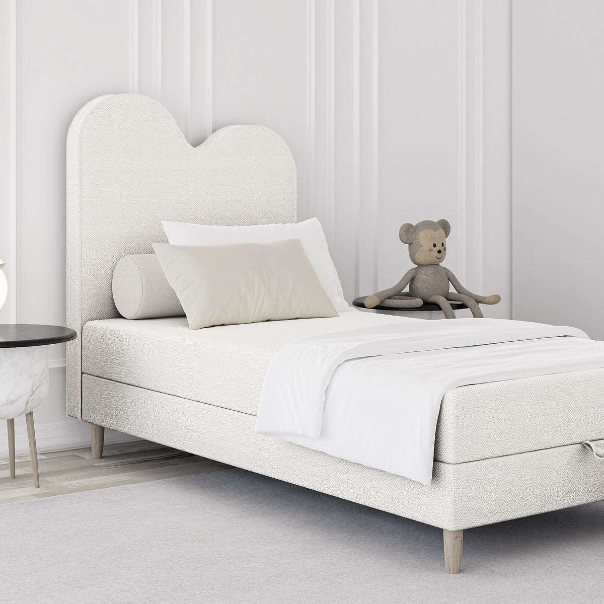 Mellia Kids Continental Divan Bed with a Wavy Headboard and Storage 90x160 and 90x180, Soft Modern Style – in a room setting