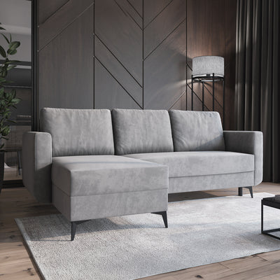 Forra-hoekbank Staalgrijs (MANILA 16) in een moderne woonkamer met vloerkleed en lamp, chaise longue aan de linkerkant